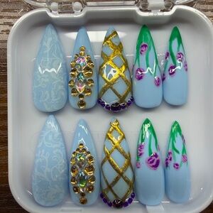 Hand-Painted Sky Blue Stiletto Press-On Nails with Gold Lattice & Floral Accents